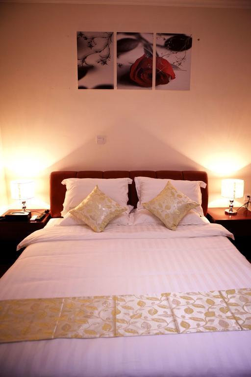 Guangzhou Yi Long International Apartment Szoba fotó